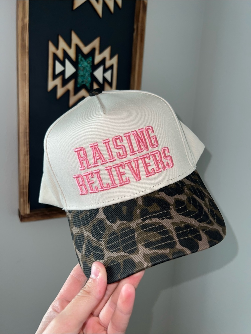 Cream Trucker Hat with Pink "Raising Believers" Embroidery and Leopard Brim